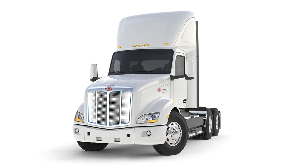 Peterbilt Model 579EV Electric White Truck Isolated - Feature Image