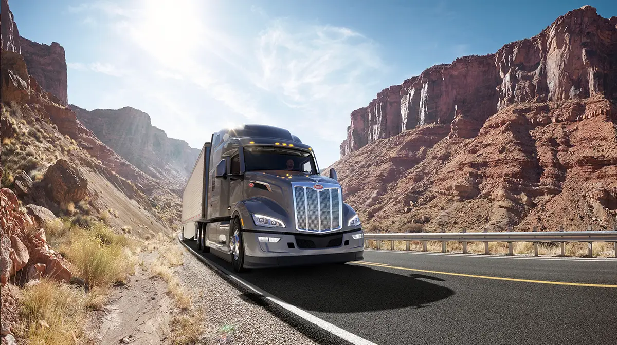Peterbilt Model 579 Drives on Highway in Desert